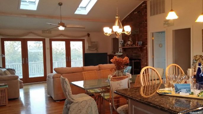 Dining room, Fireplace, Interior, Living room, Pendant Lights, Wood Texture Flooring