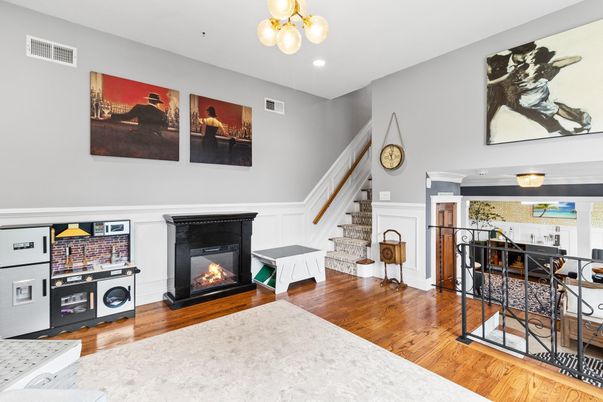 Fireplace, Interior, Pendant Lights, Recessed Lighting, Wood Texture Flooring