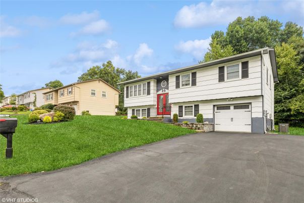 Attached, Exterior, Facade, Raised Ranch