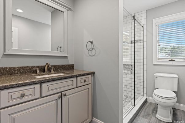 Bathroom, Glass Shower, Interior, Recessed Lighting, Wood Texture Flooring