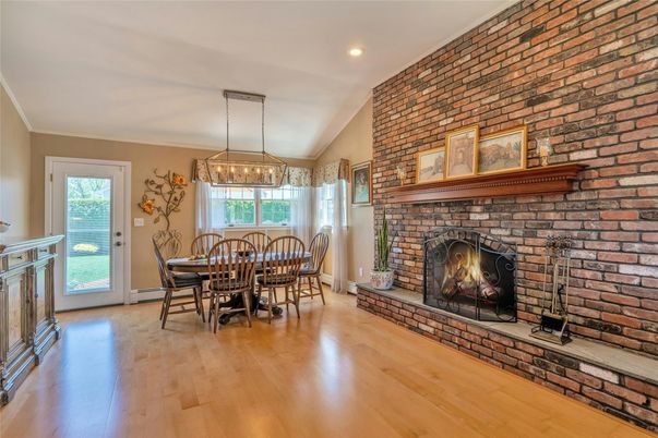 Dining room, Fireplace, Interior, Pendant Lights, Recessed Lighting, Stone Walls, Wood Texture Flooring