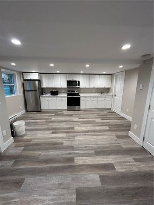 Interior, Kitchen, Recessed Lighting, Stainless Steel Appliances, Wood Texture Flooring