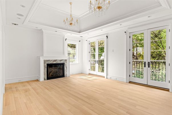 Chandelier, Empty room, Fireplace, Interior, Recessed Lighting, Wood Texture Flooring