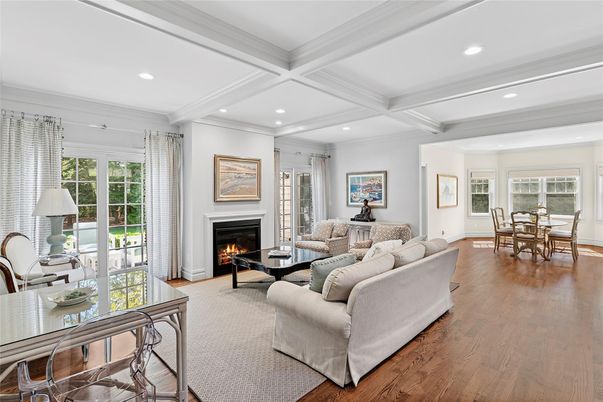 Dining room, Fireplace, Interior, Living room, Recessed Lighting, Wood Texture Flooring