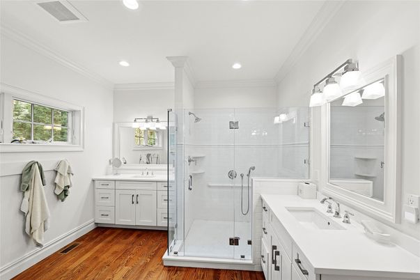 Bathroom, Dual Sink Vanities, Glass Shower, Interior, Recessed Lighting, Wood Texture Flooring