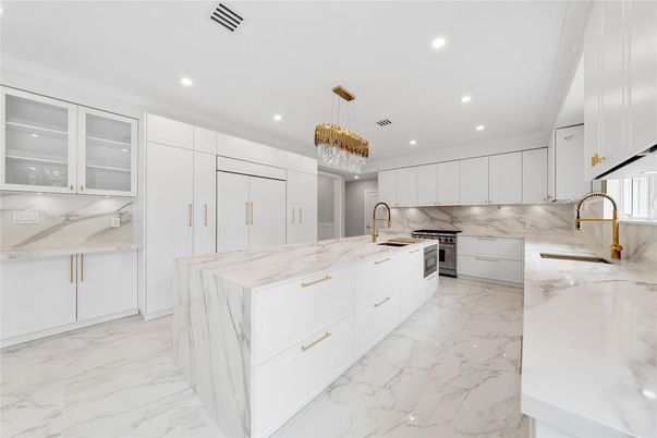 Chandelier, Interior, Kitchen, Marble, Marble Walls, Pendant Lights, Recessed Lighting, Stainless Steel Appliances
