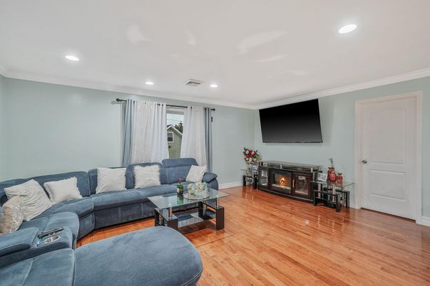 Fireplace, Interior, Living room, Recessed Lighting, Wood Texture Flooring