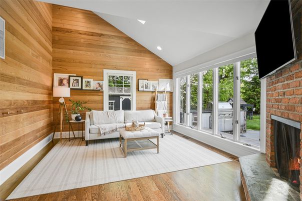 Fireplace, Interior, Living room, Recessed Lighting, Stone Walls, Wood Texture Flooring, Wooden Walls