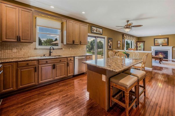 Dining room, Fireplace, Interior, Kitchen, Recessed Lighting, Wood Texture Flooring