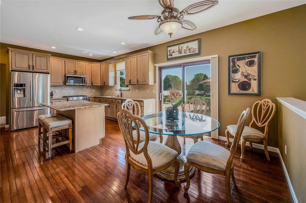 Dining room, Interior, Kitchen, Recessed Lighting, Stainless Steel Appliances, Wood Texture Flooring