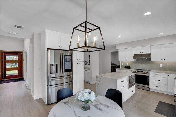 Interior, Kitchen, Pendant Lights, Recessed Lighting, Stainless Steel Appliances, Wood Texture Flooring