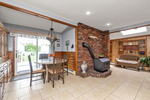 Dining room, Fireplace, Interior, Pendant Lights, Recessed Lighting, Stone Walls, Wooden Walls