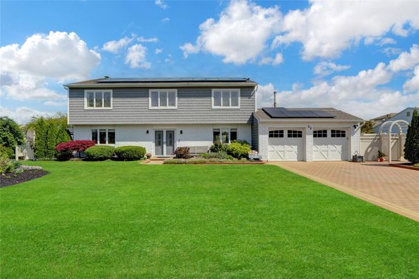 Attached, Backyard, Exterior, Facade, Solar Panels, Split Level