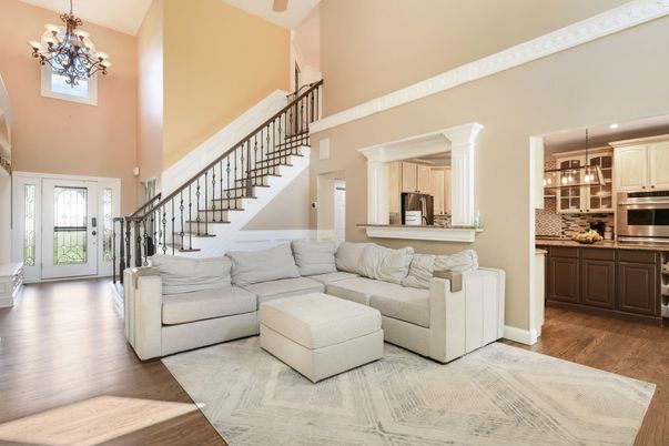 Chandelier, Interior, Kitchen, Living room, Pendant Lights, Recessed Lighting, Stainless Steel Appliances, Wood Texture Flooring