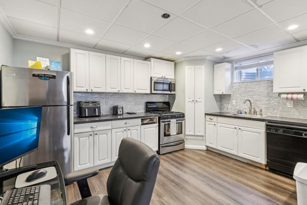 Interior, Kitchen, Recessed Lighting, Stainless Steel Appliances, Wood Texture Flooring
