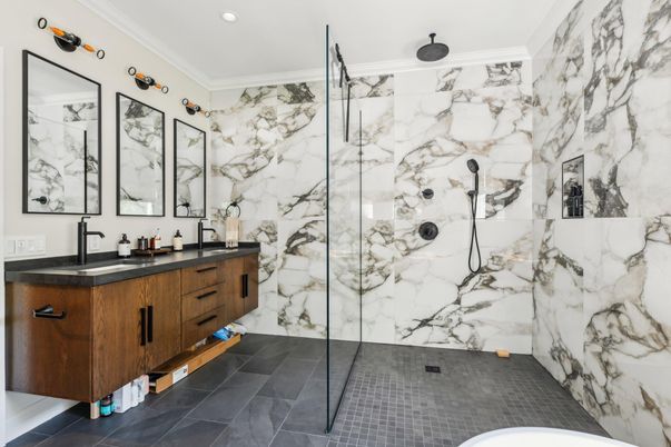 Bathroom, Dual Sink Vanities, Glass Shower, Interior, Marble Walls, Recessed Lighting