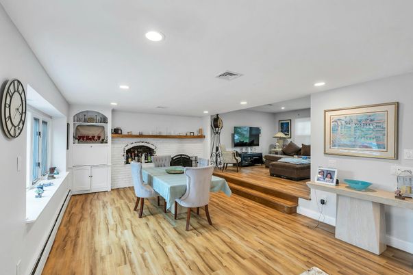 Dining room, Interior, Living room, Recessed Lighting, Stone Walls, Wood Texture Flooring