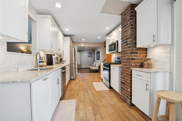 Interior, Kitchen, Recessed Lighting, Stainless Steel Appliances, Stone Walls, Wood Texture Flooring