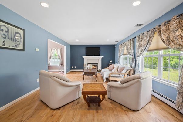 Fireplace, Interior, Living room, Recessed Lighting, Wood Texture Flooring