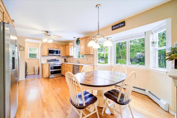 Dining room, Interior, Kitchen, Pendant Lights, Stainless Steel Appliances, Wood Texture Flooring