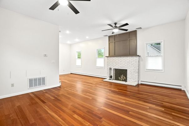Empty room, Fireplace, Interior, Recessed Lighting, Wood Texture Flooring