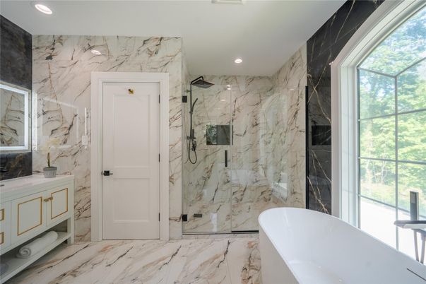 Bathroom, Free Standing Baths, Glass Shower, Interior, Marble, Marble Walls, Recessed Lighting