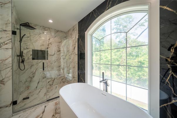 Bathroom, Free Standing Baths, Glass Shower, Interior, Marble, Marble Walls, Recessed Lighting