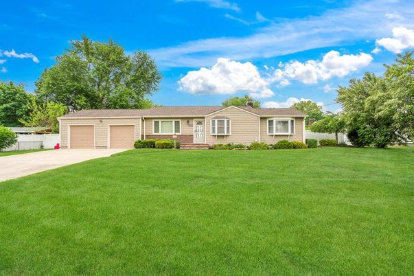 Attached, Backyard, Exterior, Facade, Brick Facade, Ranch