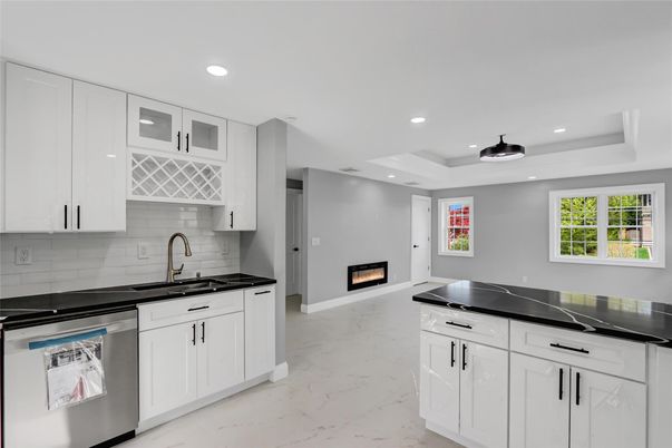 Fireplace, Interior, Kitchen, Marble, Recessed Lighting, Stainless Steel Appliances