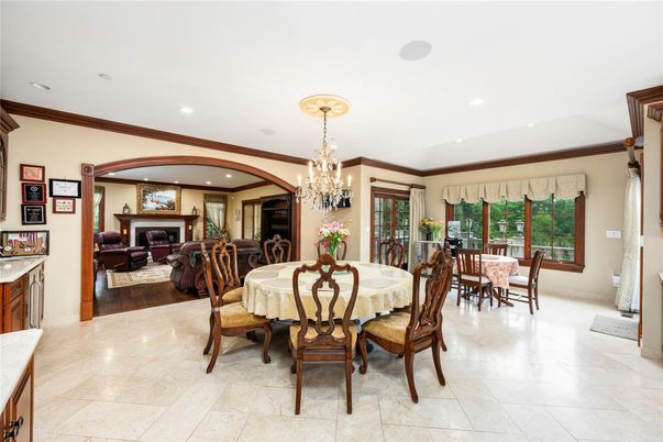 Chandelier, Dining room, Fireplace, Interior, Living room, Recessed Lighting, Wood Texture Flooring