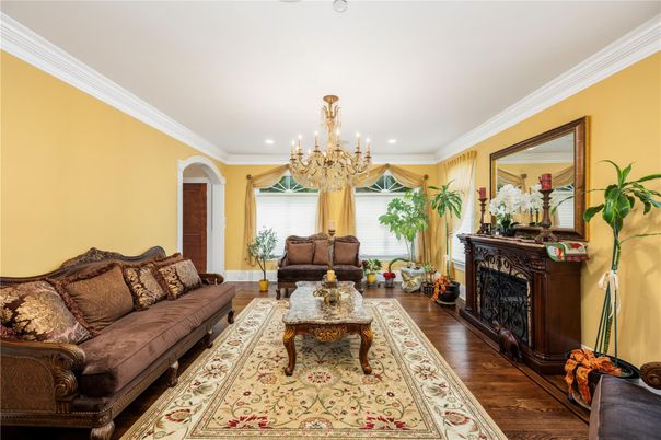 Chandelier, Fireplace, Interior, Living room, Recessed Lighting, Wood Texture Flooring