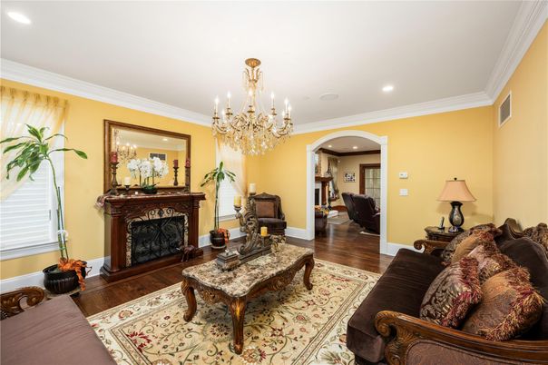 Chandelier, Fireplace, Interior, Living room, Recessed Lighting, Wood Texture Flooring