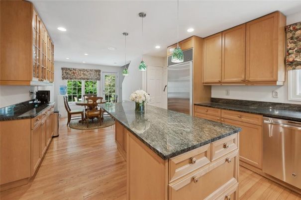 Dining room, Interior, Kitchen, Pendant Lights, Recessed Lighting, Stainless Steel Appliances, Wood Texture Flooring