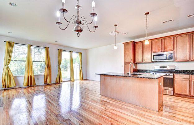 Chandelier, Interior, Kitchen, Pendant Lights, Recessed Lighting, Stainless Steel Appliances, Wood Texture Flooring