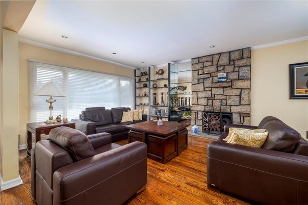 Fireplace, Interior, Living room, Recessed Lighting, Stone Walls, Wood Texture Flooring