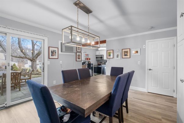 Dining room, Interior, Kitchen, Pendant Lights, Stainless Steel Appliances, Wood Texture Flooring