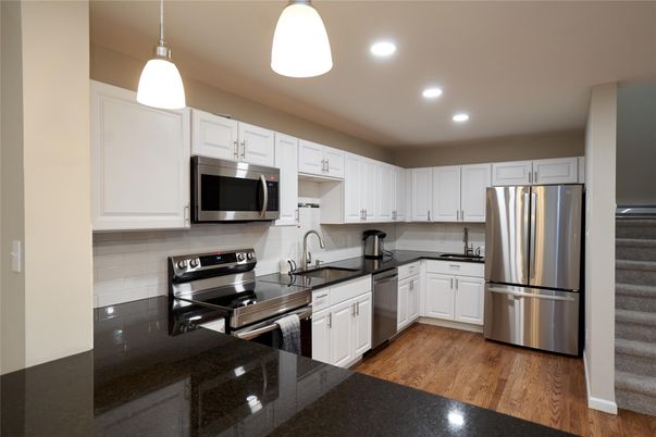 Interior, Kitchen, Pendant Lights, Recessed Lighting, Stainless Steel Appliances, Wood Texture Flooring