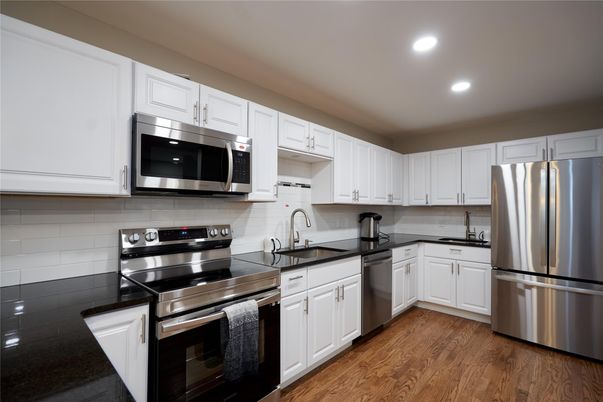 Interior, Kitchen, Recessed Lighting, Stainless Steel Appliances, Wood Texture Flooring