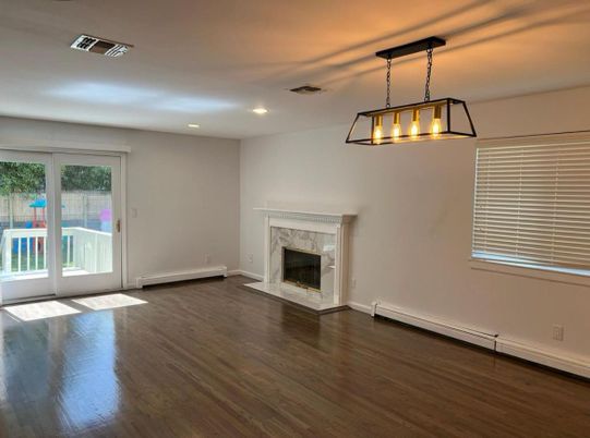 Empty room, Fireplace, Interior, Pendant Lights, Recessed Lighting, Wood Texture Flooring