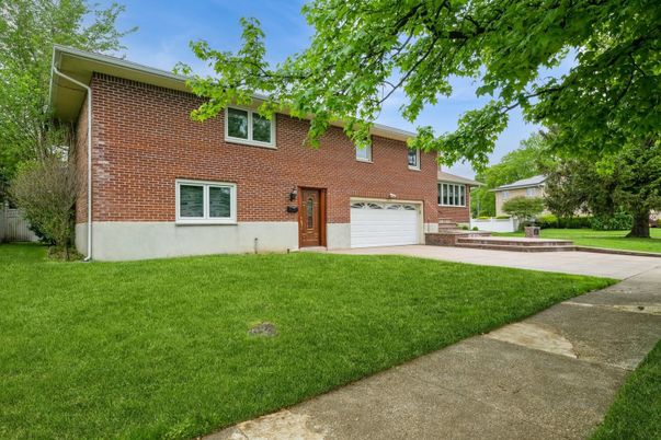 Attached, Backyard, Exterior, Facade, Brick Facade, Rowhouse