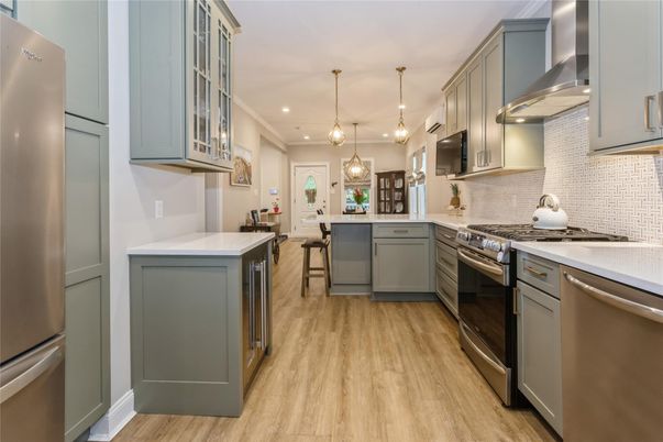Interior, Kitchen, Pendant Lights, Recessed Lighting, Stainless Steel Appliances, Wood Texture Flooring