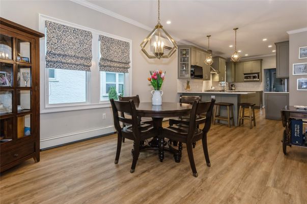 Dining room, Interior, Kitchen, Pendant Lights, Recessed Lighting, Stainless Steel Appliances, Wood Texture Flooring
