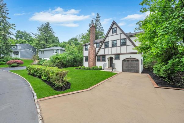 Attached, Backyard, Exterior, Facade, Brick Facade, Tudor Revival