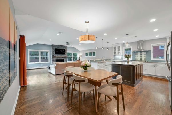 Dining room, Fireplace, Interior, Kitchen, Living room, Pendant Lights, Recessed Lighting, Stainless Steel Appliances, Wood Texture Flooring