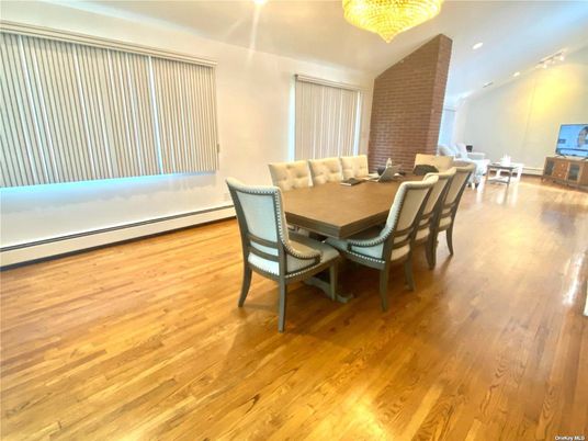 Chandelier, Dining room, Interior, Recessed Lighting, Stone Walls, Wood Texture Flooring