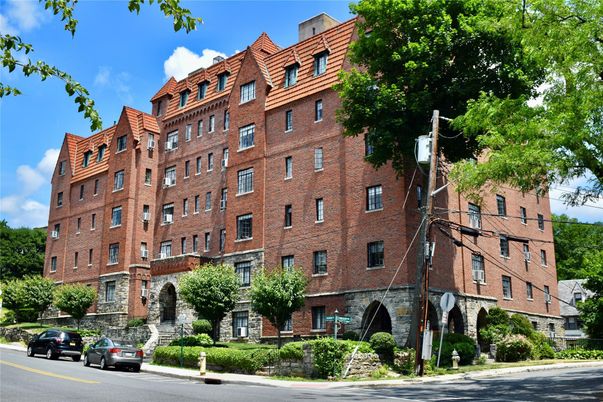 Exterior, Facade, Brick Facade, Condo Building
