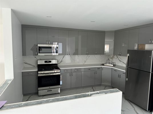 Interior, Kitchen, Marble, Marble Walls, Recessed Lighting, Stainless Steel Appliances