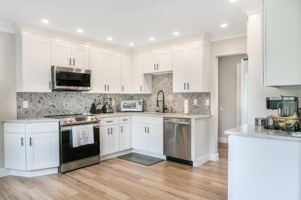 Interior, Kitchen, Recessed Lighting, Stainless Steel Appliances, Wood Texture Flooring