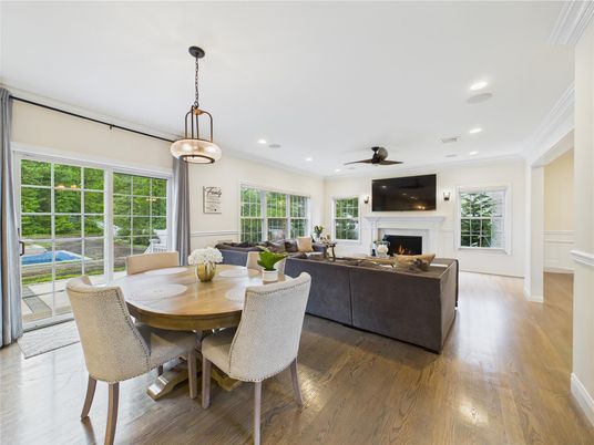Dining room, Fireplace, Interior, Living room, Pendant Lights, Recessed Lighting, Wood Texture Flooring
