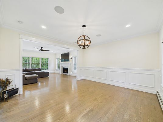 Chandelier, Fireplace, Interior, Living room, Recessed Lighting, Wood Texture Flooring
